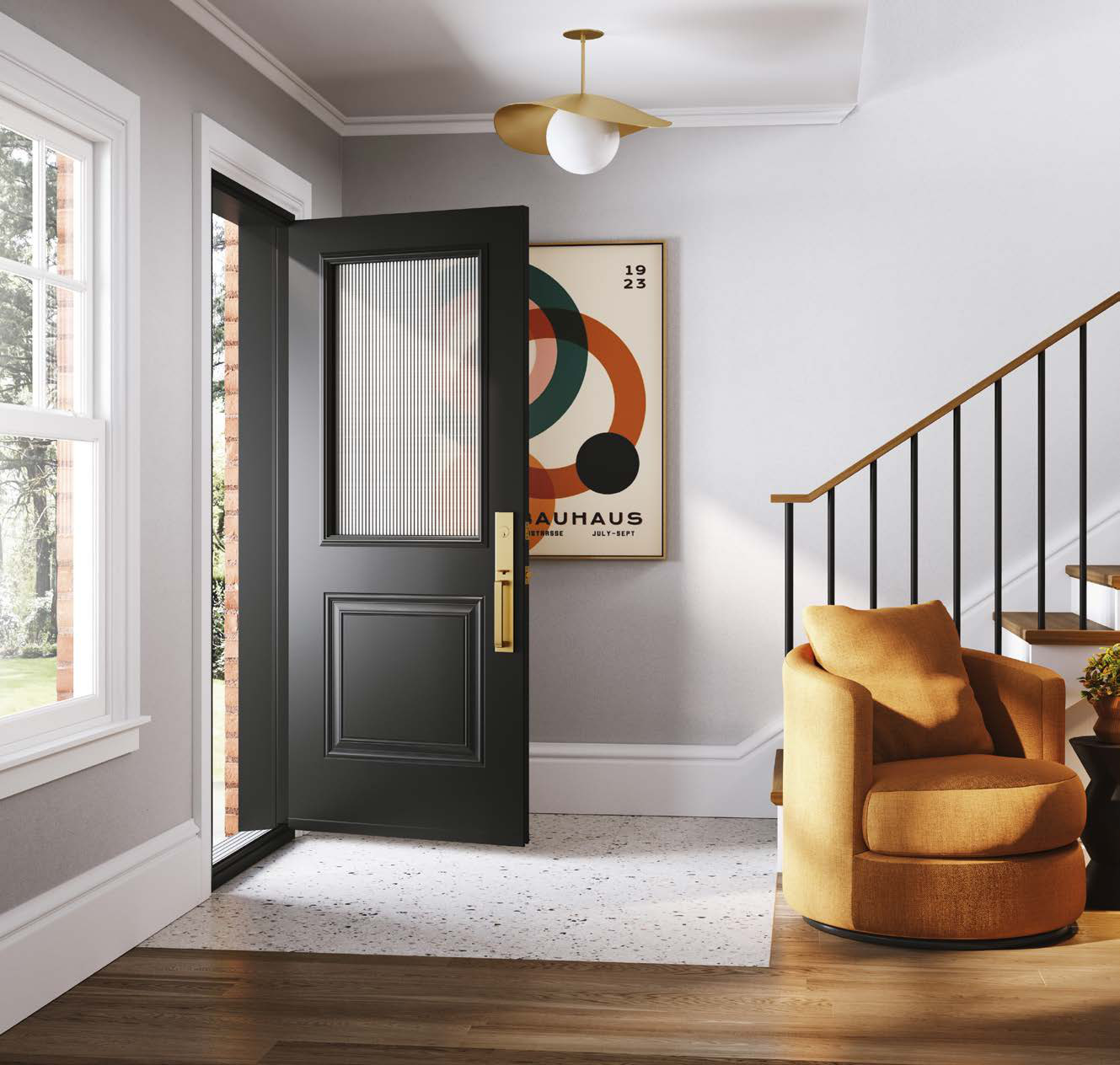 Vestibule clair avec une porte d'entrée noire à vitrage cannelé